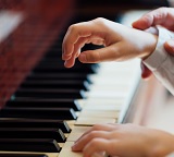 Student in a private piano lesson